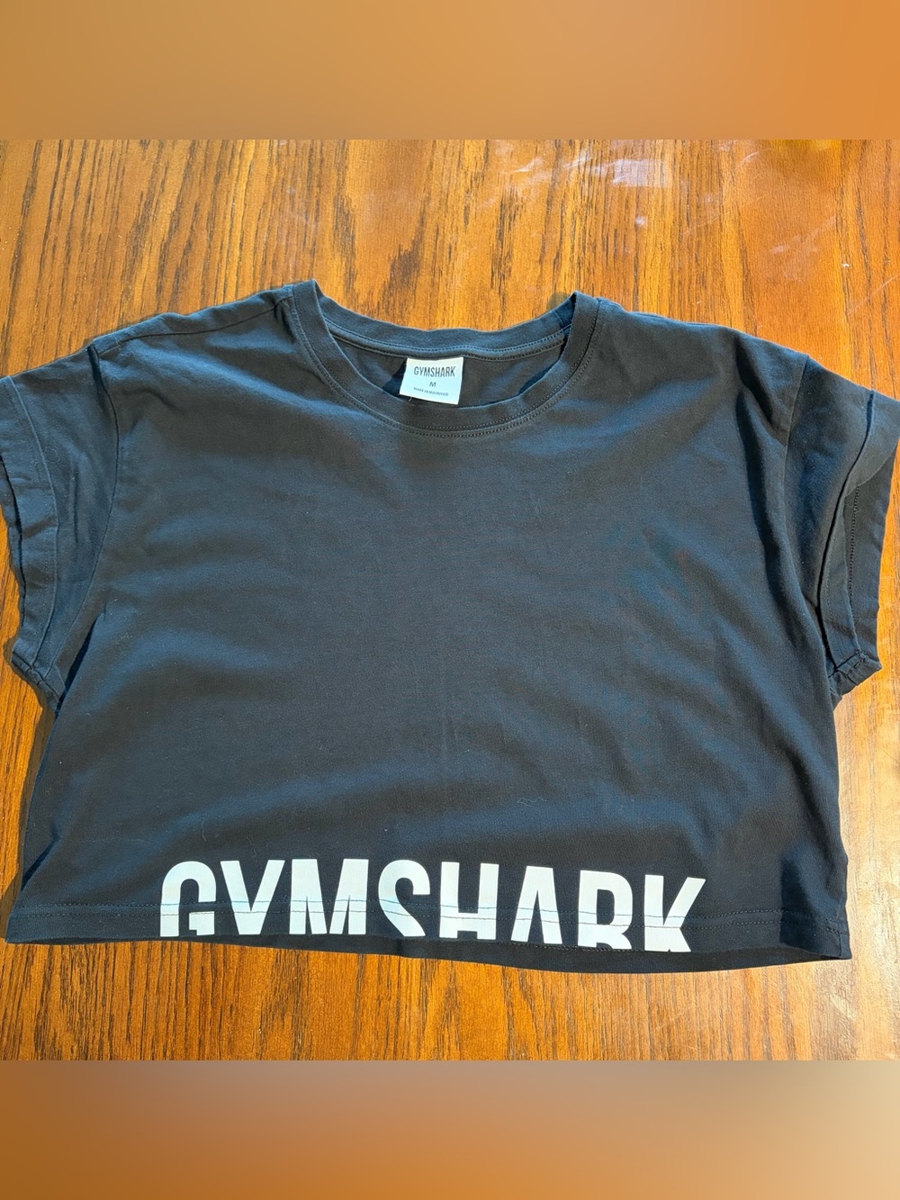 Gymshark Black Short Sleeve Cropped Tee with White Hem Logo